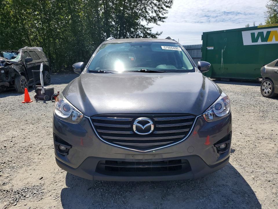 2016 Mazda Cx-5 VIN JM3KE4DY6G0900033 COPART salvage auction — MINOR DENT/SCRATCHES, Wa - Vehicle Cert Of Ownership-Titl, sold $2,200 on 2026-07-09 (photo 5)