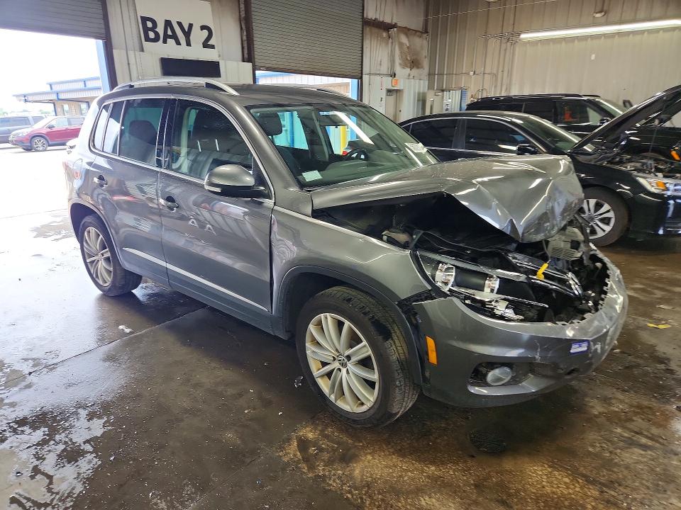 2014 Volkswagen Tiguan VIN WVGBV3AX4EW591814 COPART salvage auction — FRONT END, Il - Salvage Certificate, sold $1,350 on 2026-07-28 (photo 4)