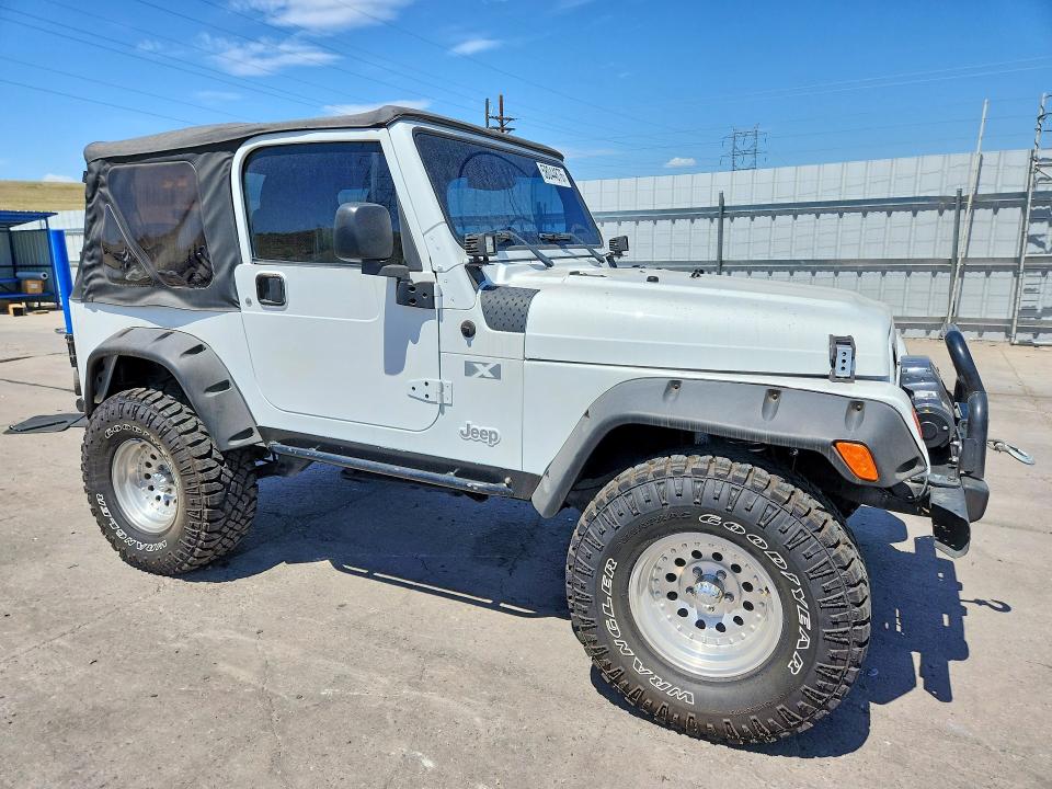 2004 Jeep Wrangler / VIN 1J4FA39S94P700586 COPART salvage auction — NORMAL WEAR, Co - Cert Of Title-Rebuilt Salvage, sold $4,000 on 2026-07-08 (photo 4)