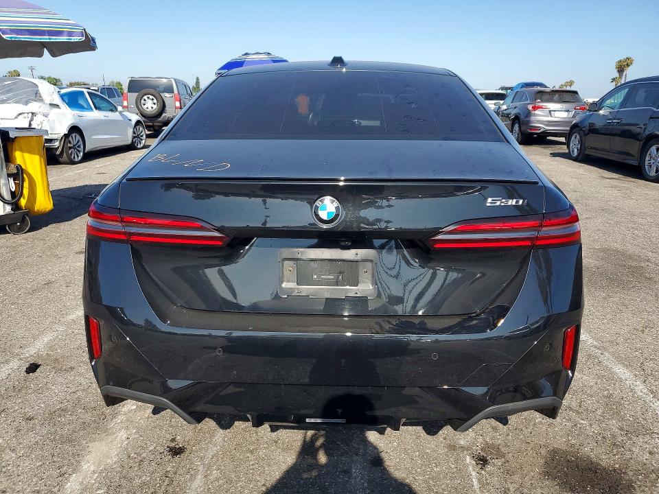 2024 BMW VIN WBA43FJ00RCS32245 COPART salvage auction — SIDE, Ca - Salvage Certificate, sold $28,750 on 2026-08-21 (photo 6)