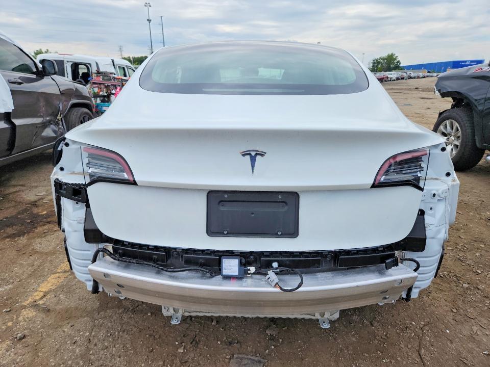 2020 Tesla Model 3 VIN 5YJ3E1EAXLF736987 COPART salvage auction — REAR END, Mi - Certificate Of Title, sold $9,300 on 2026-07-28 (photo 6)