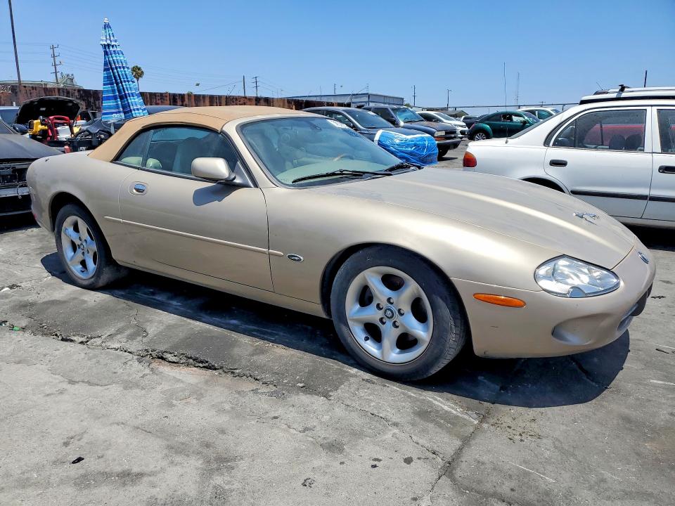2000 Jaguar XK VIN SAJJA42C0YNA02298 COPART salvage auction — NORMAL WEAR, CA - DIS/DLR/EXP ONLY CLEAN TITLE, sold $3,450 on 2026-09-16 (photo 4)