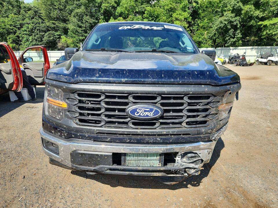 2024 Ford F-150 lightning VIN 1FTMF1L54RKE58347 COPART salvage auction — ALL OVER, Tx - Salvage Vehicle Title, sold $19,100 on 2026-08-20 (photo 5)