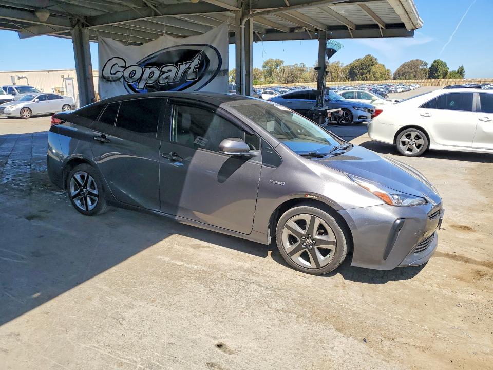 2021 Toyota Prius VIN JTDKAMFU7M3144074 COPART salvage auction — SIDE, Ca - Salvage Certificate, sold $1,700 on 2026-07-28 (photo 4)