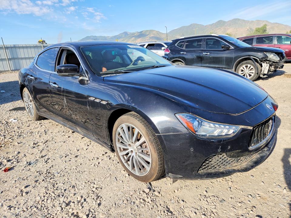 2015 Maserati Ghibli VIN ZAM57RTA0F1135343 COPART salvage auction — MECHANICAL, OR - SALVAGE TITLE CERTIFICATE, sold $4,000 on 2026-08-12 (photo 4)