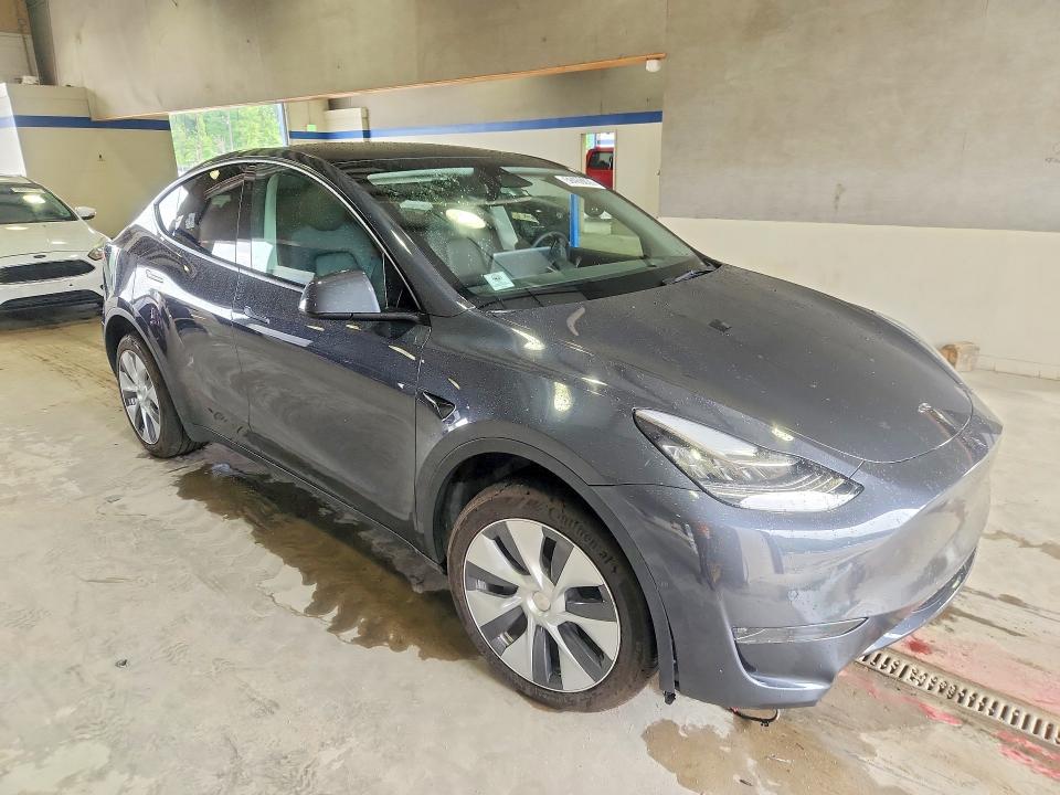 2022 Tesla Model y VIN 7SAYGDEE9NA005510 COPART salvage auction — NORMAL WEAR, Va - Cert Of Title - Salvage, sold $2,550 on 2026-07-24 (photo 4)