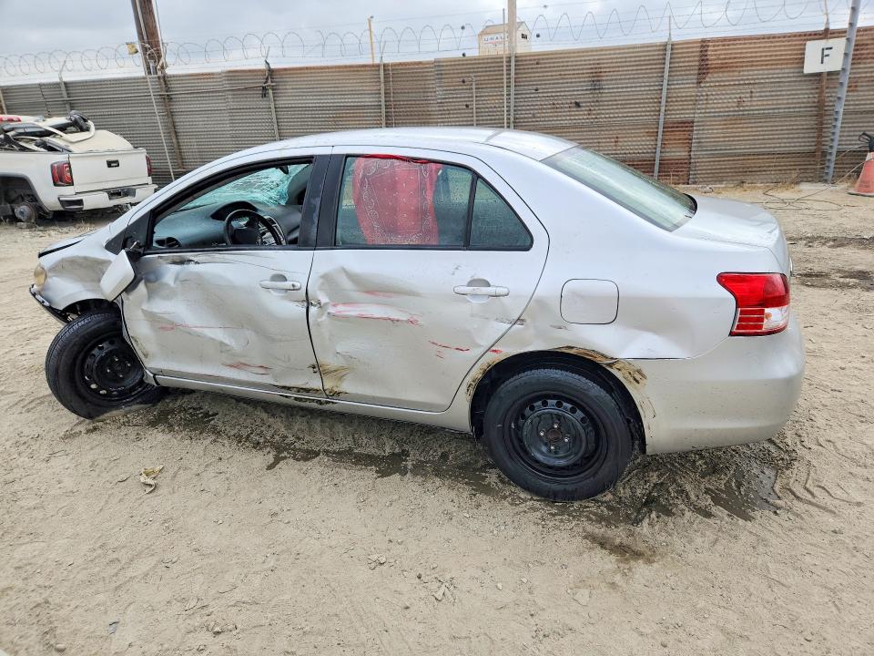 2012 Toyota Yaris VIN JTDBT4K37CL019985 COPART salvage auction — FRONT END, Ca - Salvage Certificate, sold $425 on 2026-07-30 (photo 2)