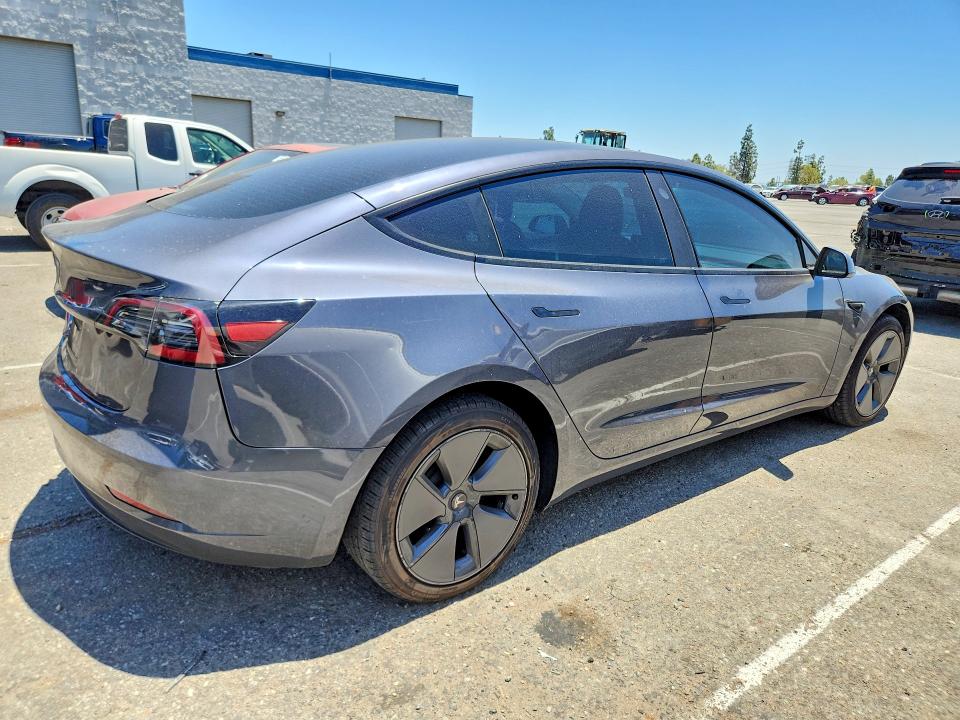2023 Tesla Model 3 VIN 5YJ3E1EA8PF692056 COPART salvage auction — REAR END, Ca - Salvage Certificate, sold $7,700 on 2026-07-16 (photo 3)