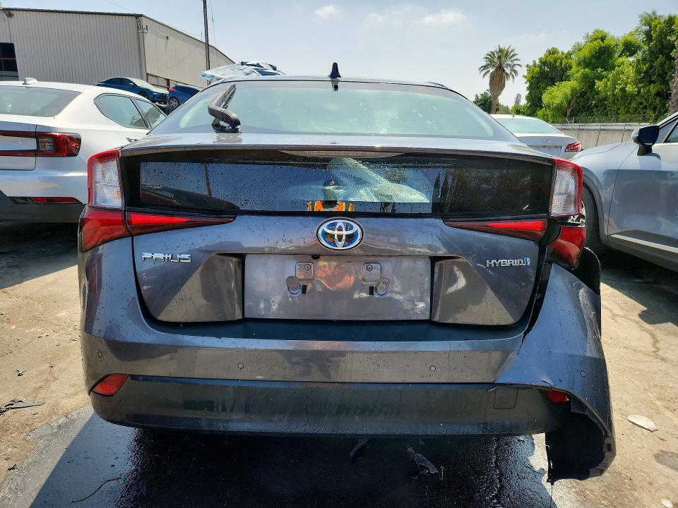 2021 Toyota Prius VIN JTDKAMFUXM3150953 COPART salvage auction — REAR END, CA - CERTIFICATE OF TITLE, sold $12,400 on 2026-08-18 (photo 6)