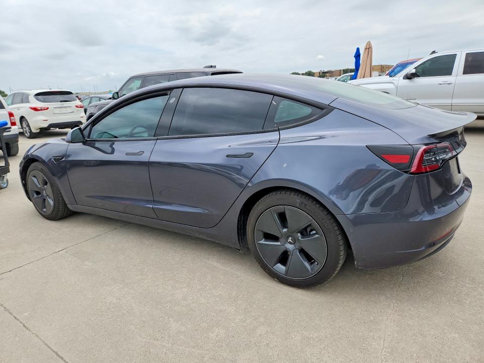 2021 Tesla Model 3 VIN 5YJ3E1EA7MF093886 COPART salvage auction — NORMAL WEAR, Tx - Cert Of Title-Rebuilt Salvage (P), sold $12,600 on 2026-07-30 (photo 2)