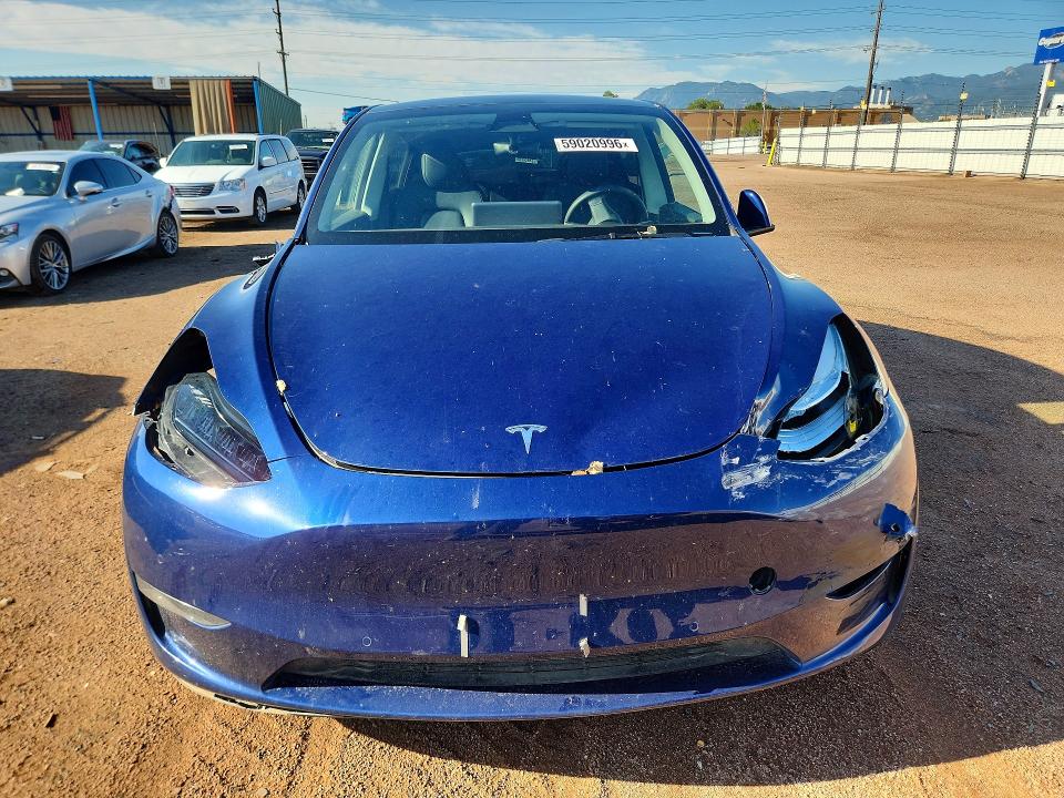 2022 Tesla Model y VIN 7SAYGDEE3NA011075 COPART salvage auction — ALL OVER, CO - SALVAGE TITLE, sold $6,600 on 2026-08-21 (photo 5)