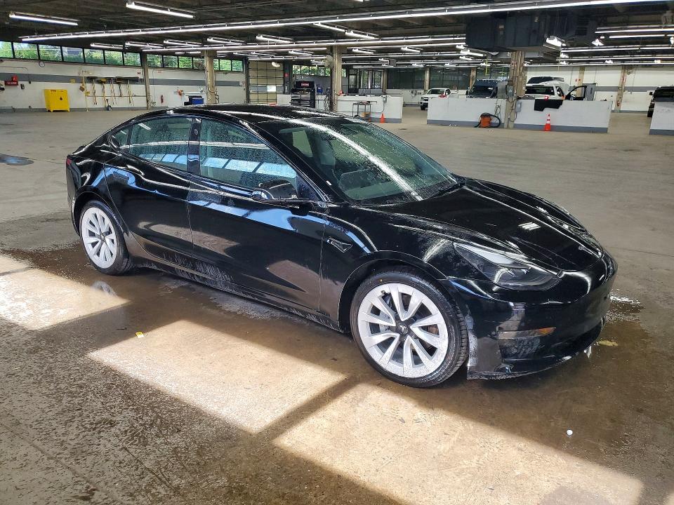 2022 Tesla Model 3 VIN 5YJ3E1EA4NF304852 COPART salvage auction — UNDERCARRIAGE, Il - Salvage Certificate, sold $6,200 on 2026-07-20 (photo 4)