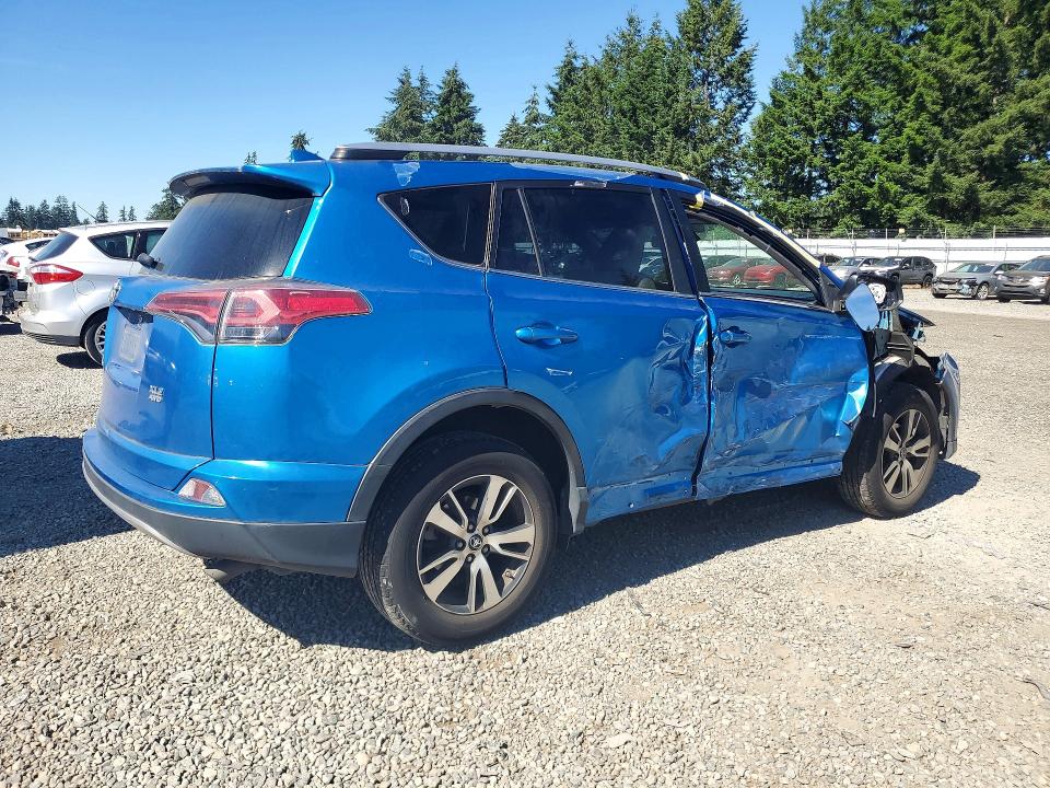 2018 Toyota Rav 4 VIN JTMRFREV1JJ192183 COPART salvage auction — SIDE, Salvage Title, sold $450 on 2026-07-21 (photo 3)
