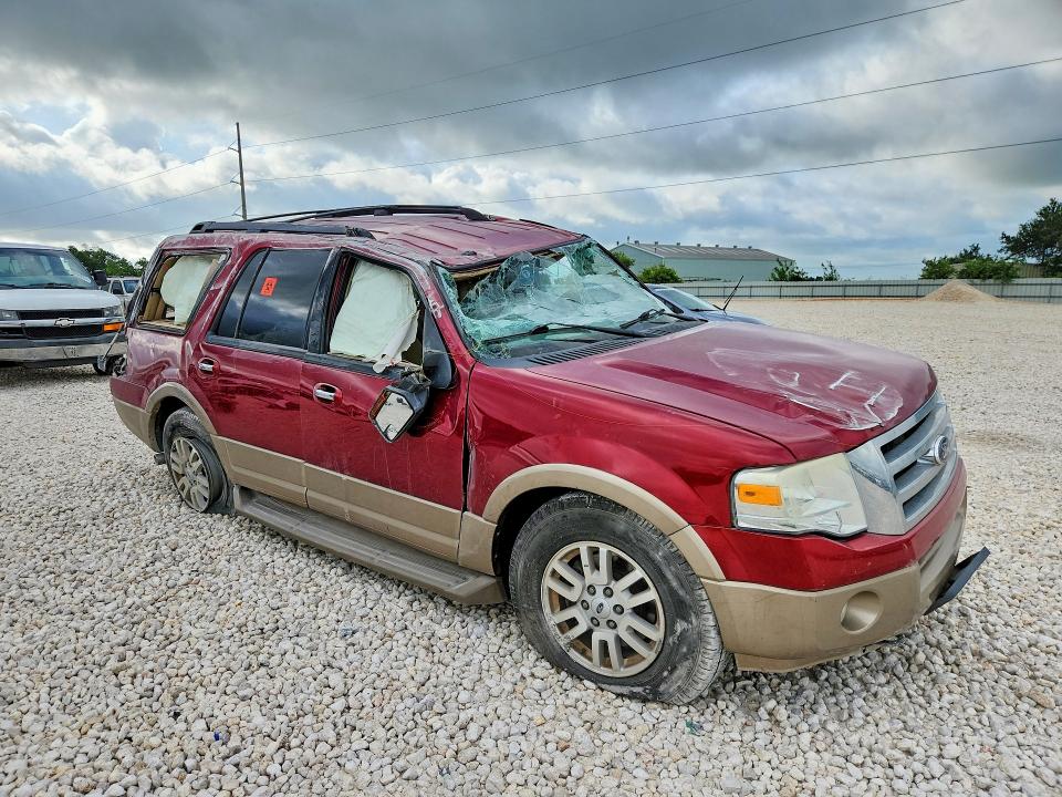 2014 Ford VIN 1FMJU1J56EEF18418 COPART salvage auction — ROLLOVER, Tx - Salvage Vehicle Title, sold $600 on 2026-07-02 (photo 4)