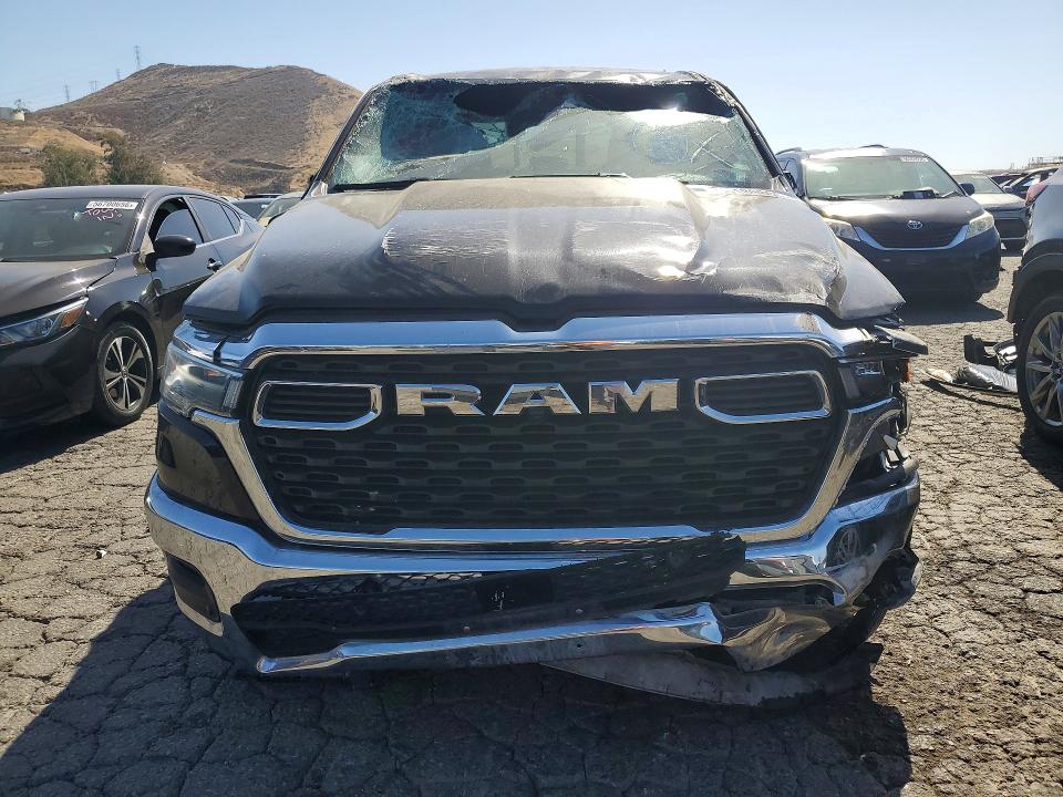 2025 Ram 1500 VIN 1C6SRFFP1SN581205 COPART salvage auction — ROLLOVER, Fl - Cert Of Title Slvg Rebuildable, sold $14,200 on 2026-07-27 (photo 5)