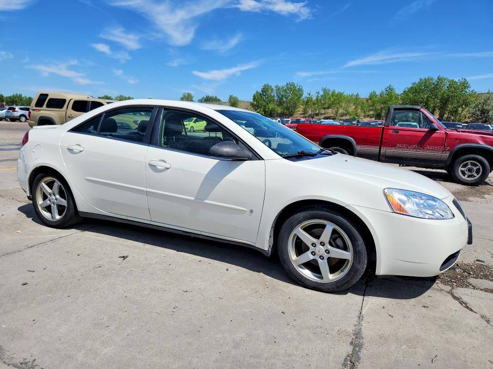 2007 Pontiac G6 VIN 1G2ZG58N474104949 COPART salvage auction — WATER/FLOOD, CO - SALVAGE TITLE, sold $275 on 2026-07-22 (photo 4)