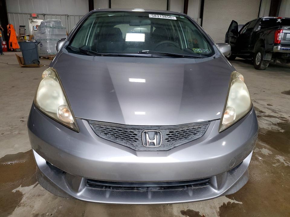 2009 Honda Fit VIN JHMGE88429S018375 COPART salvage auction — NORMAL WEAR, Pa - Non Public Clean Title, sold $825 on 2026-07-29 (photo 5)