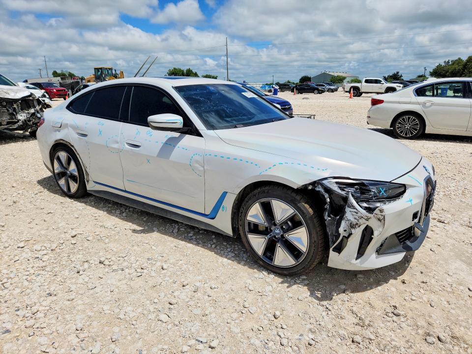 2023 BMW VIN WBY73AW02PFP85873 COPART salvage auction — SIDE, TX - SALVAGE VEHICLE TITLE (P), sold $12,100 on 2026-07-23 (photo 4)