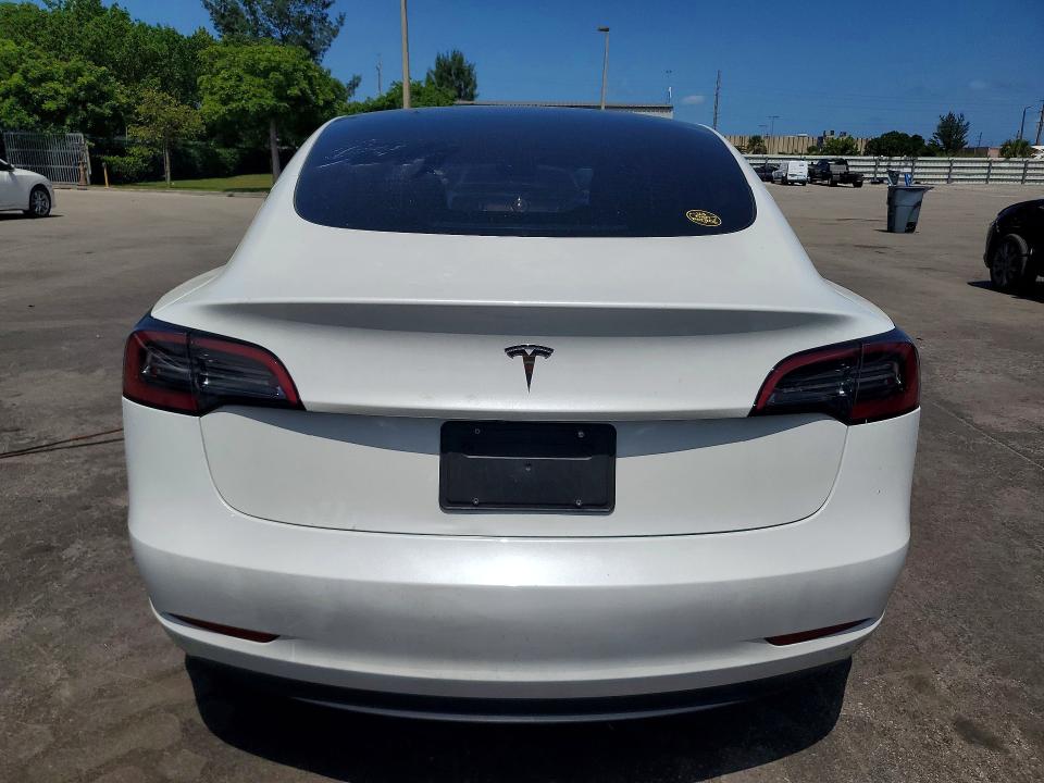 2023 Tesla Model 3 VIN 5YJ3E1EA3PF670241 COPART salvage auction — FRONT END, FL - CERTIFICATE OF DESTRUCTION, sold $8,600 on 2026-07-27 (photo 6)