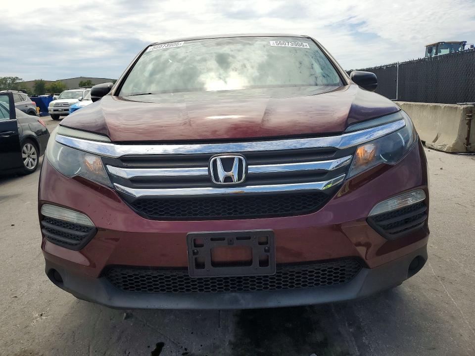 2018 Honda Pilot VIN 5FNYF6H11JB068635 COPART salvage auction — MINOR DENT/SCRATCHES, In - Certificate Of Title (P), sold $7,700 on 2026-07-02 (photo 5)