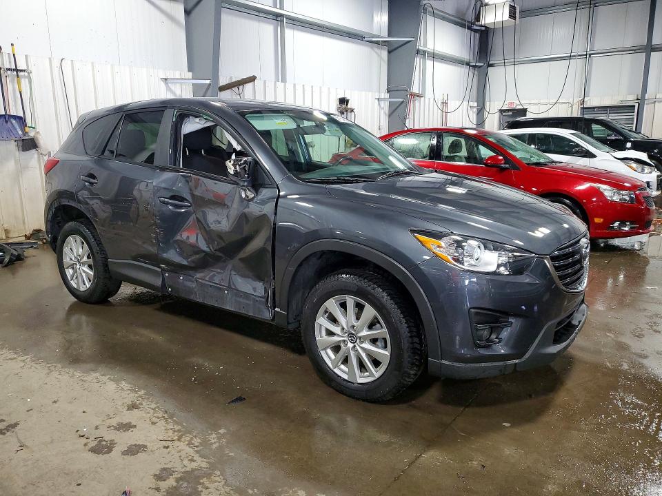 2016 Mazda VIN JM3KE4CY5G0632187 COPART salvage auction — SIDE, Mn - Cert Of Title-Salvage, sold $350 on 2026-07-21 (photo 4)