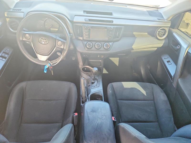 2016 Toyota Rav 4 VIN JTMZFREV6GJ094856 COPART salvage auction — ROLLOVER, Fl - Certificate Of Title, sold $2,450 on 2026-07-27 (photo 8)