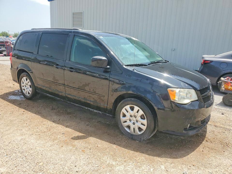 2015 Dodge Caravan VIN 2C4RDGCG0FR631634 COPART salvage auction — MINOR DENT/SCRATCHES, Tx - Cert Of Title-Rebuilt Salvage, sold $2,300 on 2026-07-18 (photo 4)