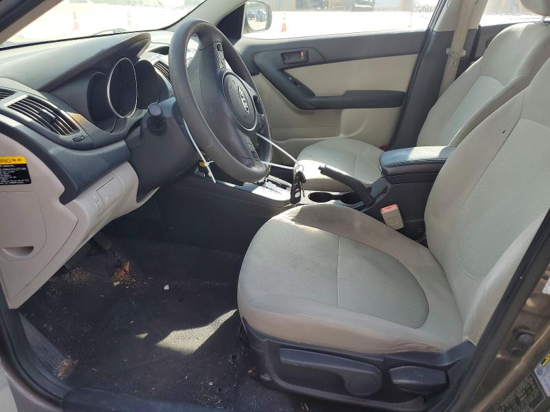 2010 Kia Forte VIN KNAFU4A20A5865476 COPART salvage auction — SIDE, Tx - Certificate Of Title, sold $975 on 2026-07-09 (photo 7)