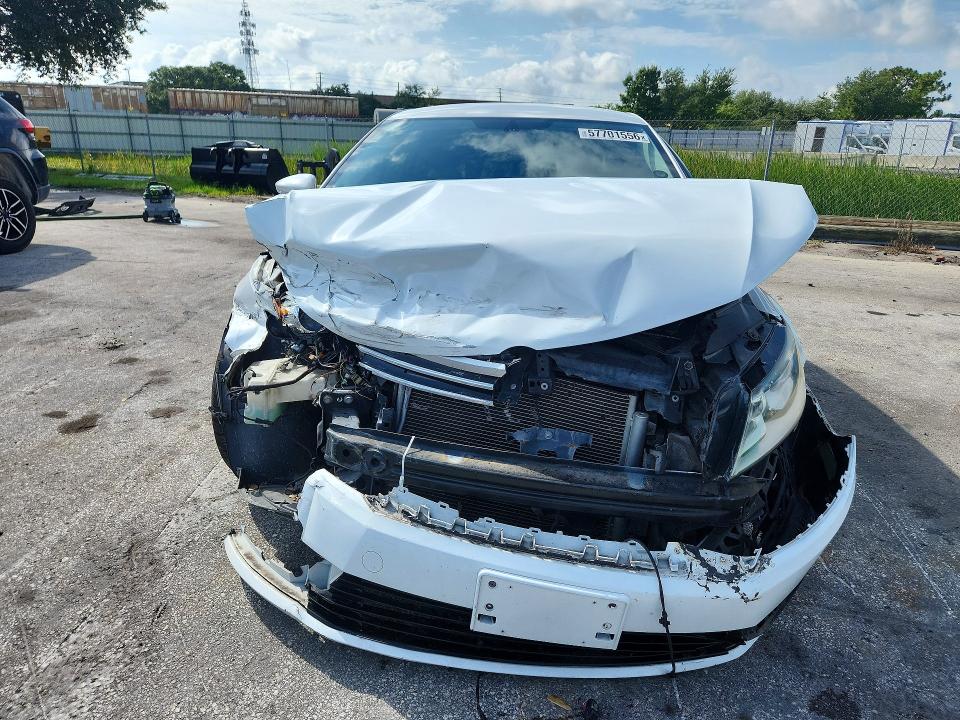 2014 Volkswagen VIN WVWBP7AN2EE537874 COPART salvage auction — FRONT END, Fl - Cert Of Title Slvg Rebuildable, sold $450 on 2026-08-06 (photo 5)