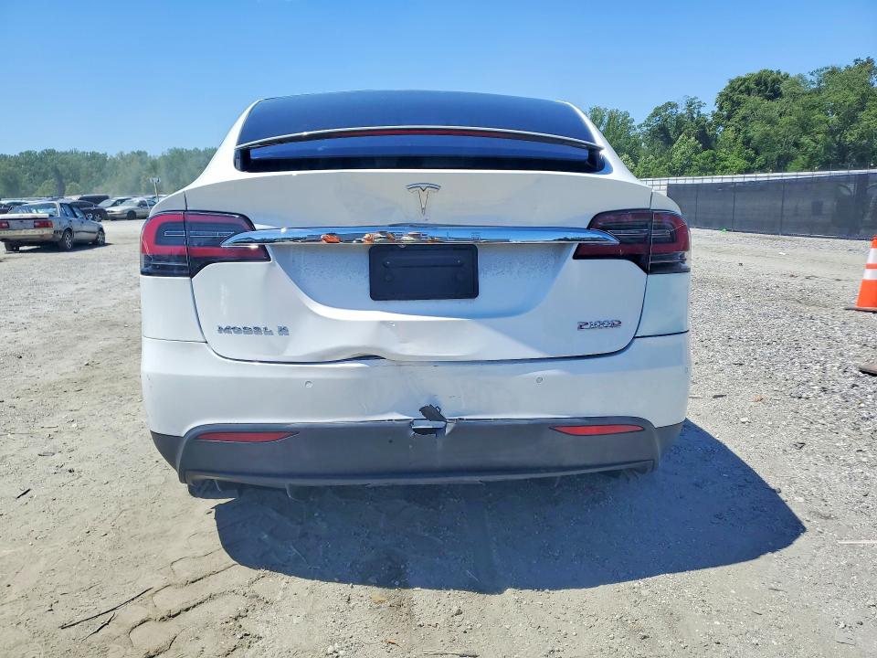 2018 Tesla VIN 5YJXCAE49JF140980 COPART salvage auction — REAR END, Sc - Cert Of Title-Salvage, sold $10,500 on 2026-07-06 (photo 6)