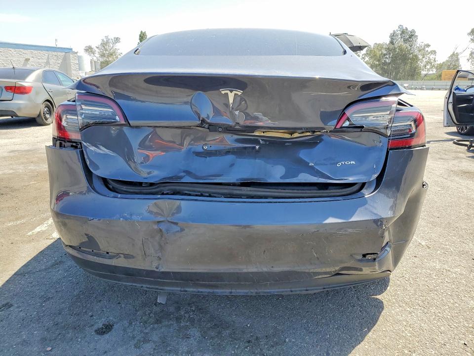 2023 Tesla VIN 5YJ3E1EB0PF392293 COPART salvage auction — REAR END, CA - SALVAGE CERTIFICATE, sold $6,300 on 2026-07-02 (photo 6)
