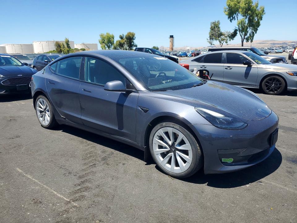 2023 Tesla Model 3 VIN 5YJ3E1EB7PF386359 COPART salvage auction — REAR END, Ca - Salvage Certificate, sold $11,100 on 2026-07-22 (photo 4)