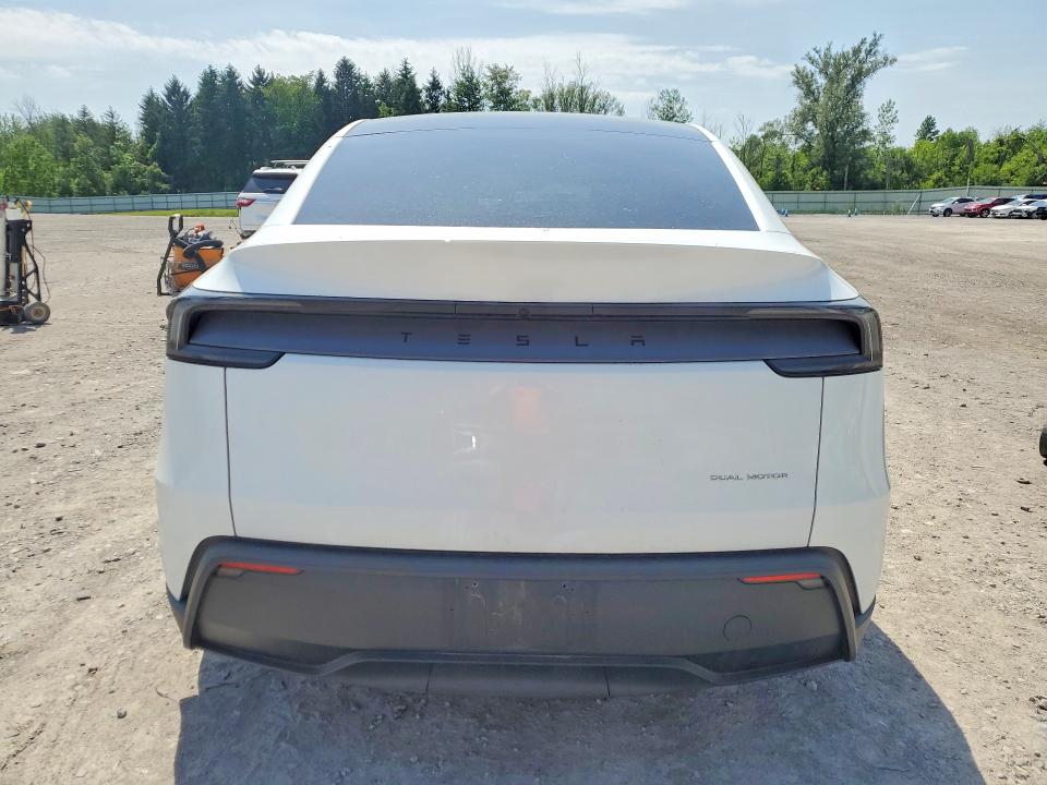 2026 Tesla Model y VIN 7SAYGDEE0TF551113 COPART salvage auction — SIDE, Ny - Mv-907A Salvage Certificate, sold $24,700 on 2026-07-20 (photo 6)