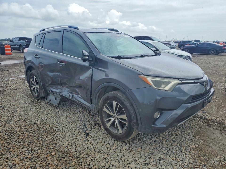 2017 Toyota Rav 4 VIN JTMWFREV5HJ712690 COPART salvage auction — SIDE, Tx - Salvage Vehicle Title, sold $5,700 on 2026-07-06 (photo 4)