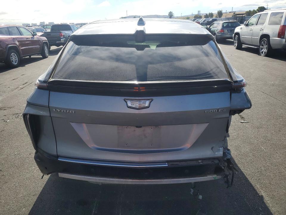 2024 Cadillac Lyriq VIN 1GYKPMRL8RZ100195 COPART salvage auction — REAR END, Ca - Salvage Certificate, sold $13,000 on 2026-07-20 (photo 6)