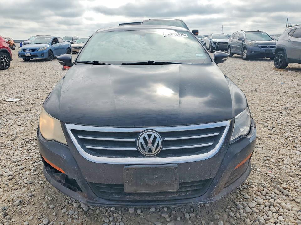 2012 Volkswagen VIN WVWMN7AN1CE538834 COPART salvage auction — REAR END, Tx - Salvage Vehicle Title, sold $325 on 2026-08-13 (photo 5)