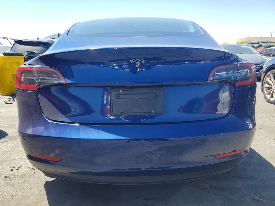 2023 Tesla Model 3 VIN 5YJ3E1EA9PF677632 COPART salvage auction — SIDE, Nv - Salvage Title, sold $8,200 on 2026-07-15 (photo 6)