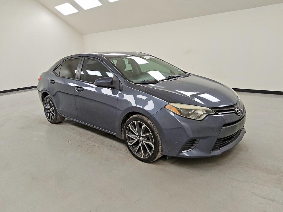 2015 Toyota Corolla VIN 5YFBURHE5FP319619 COPART salvage auction — MINOR DENT/SCRATCHES, TX - CERT OF TITLE-REBUILT SALVAGE, sold $4,050 on 2026-07-14 (photo 4)
