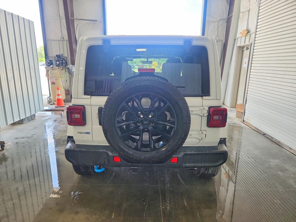 2023 Jeep Wrangler / VIN 1C4JJXP60PW556028 COPART salvage auction — NORMAL WEAR, Il - Certificate Of Title, sold $9,900 on 2026-07-09 (photo 6)