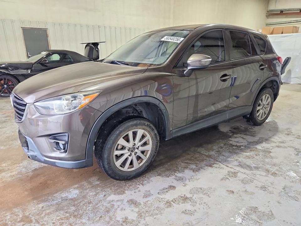2016 Mazda Cx-5 VIN JM3KE2CY0G0908490 COPART salvage auction — MINOR DENT/SCRATCHES, Nm - Certificate Of Title (P), sold $1,500 on 2026-07-15 (photo 1)