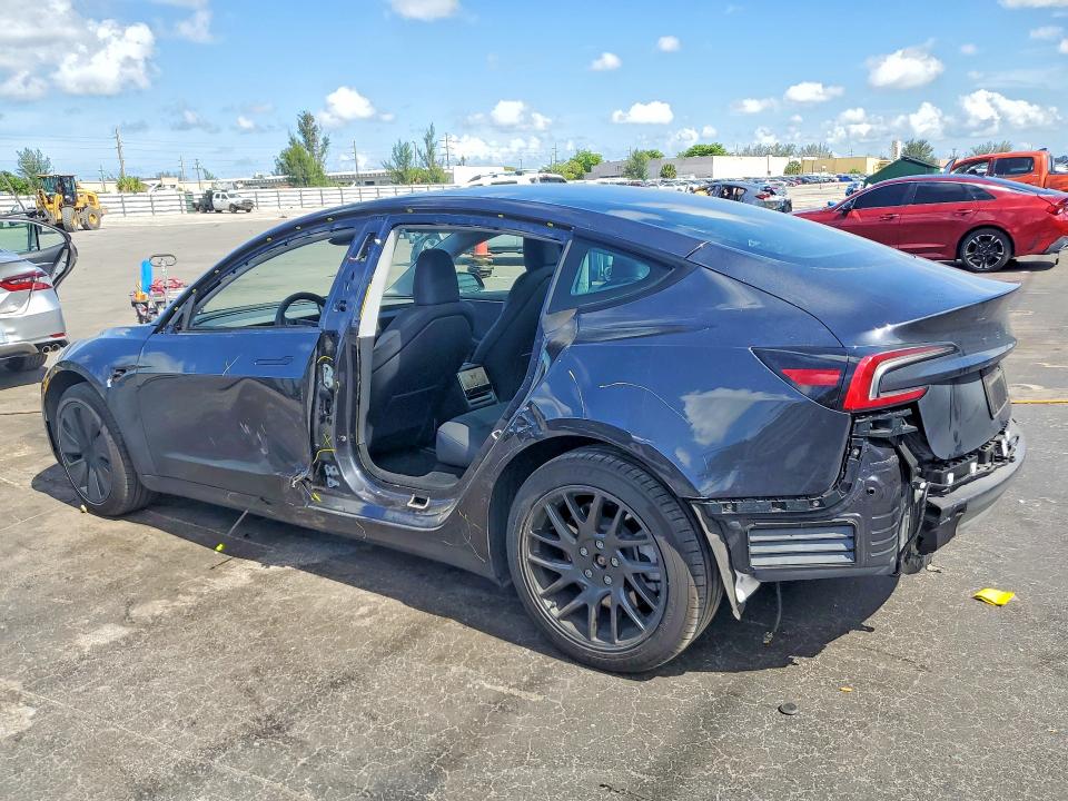 2024 Tesla Model 3 VIN 5YJ3E1EA5RF870296 COPART salvage auction — SIDE, FL - CERT OF TITLE SLVG REBUILDABLE, sold $6,900 on 2026-07-22 (photo 2)