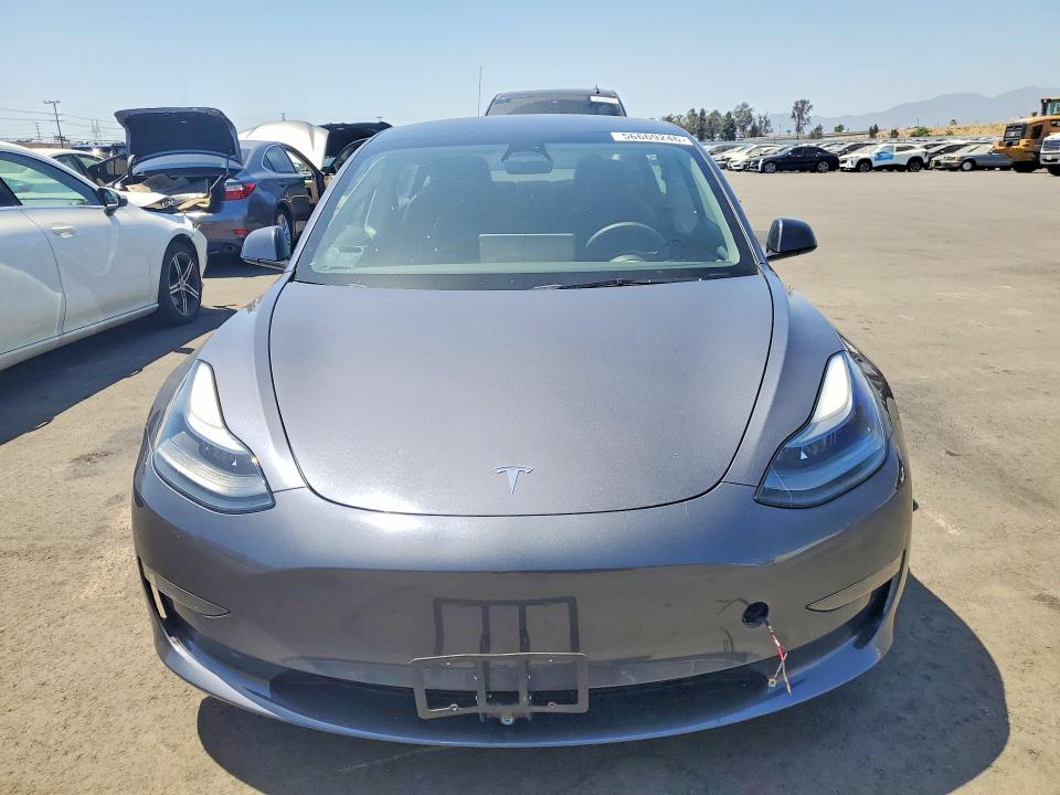 2023 Tesla Model 3 VIN 5YJ3E1EA3PF656579 COPART salvage auction — SIDE, Salvage Title, sold $8,300 on 2026-07-13 (photo 5)