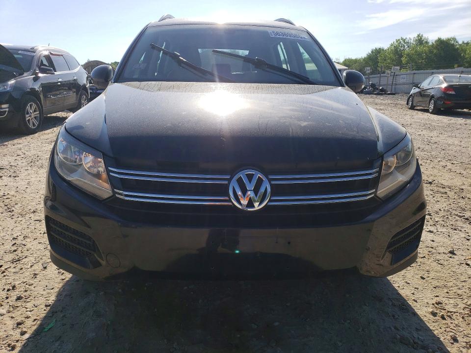 2016 Volkswagen Tiguan VIN WVGBV7AX1GW594647 COPART salvage auction — MECHANICAL, Ma - Certificate Of Title, sold $1,800 on 2026-07-11 (photo 5)