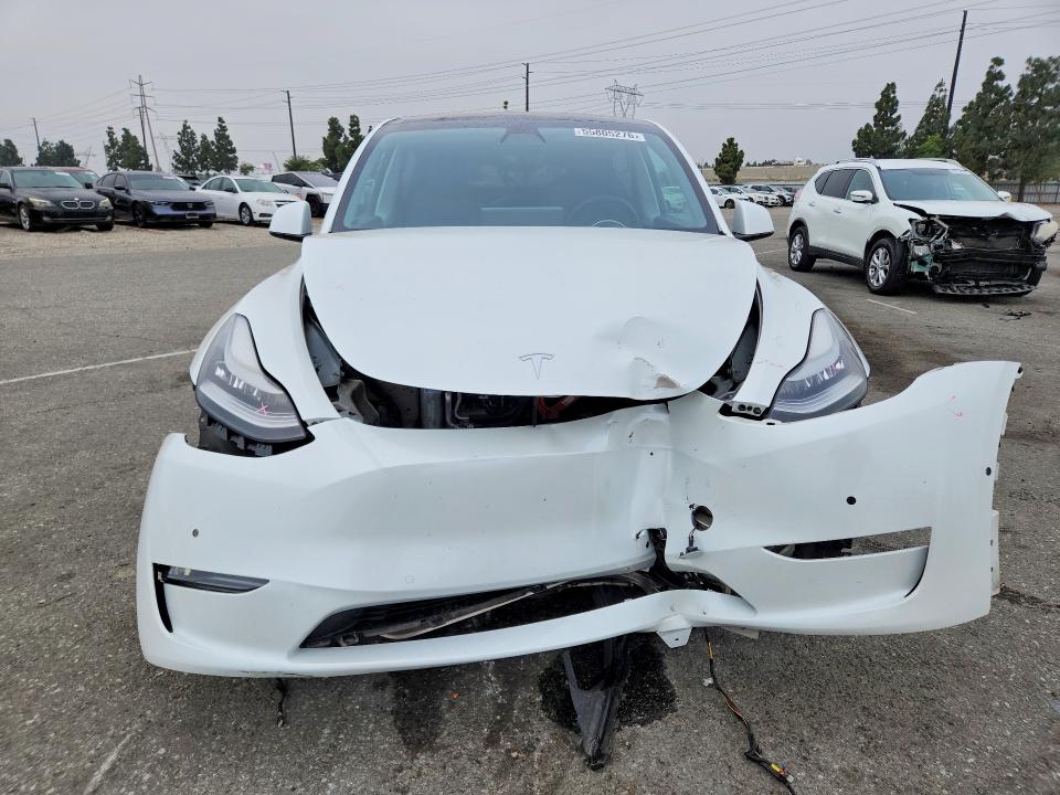 2021 Tesla VIN 5YJYGDED7MF125909 COPART salvage auction — FRONT END, Ca - Salvage Certificate, sold $8,300 on 2026-07-17 (photo 5)