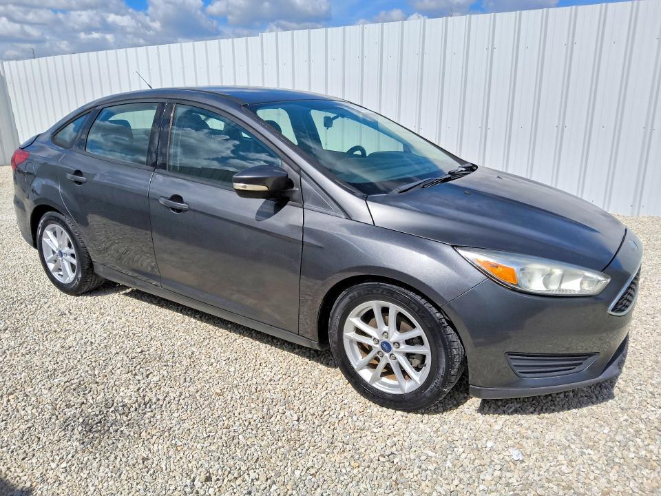 2016 Ford Focus VIN 1FADP3F23GL390825 COPART salvage auction — REAR END, Fl - Certificate Of Title, sold $125 on 2026-07-07 (photo 4)