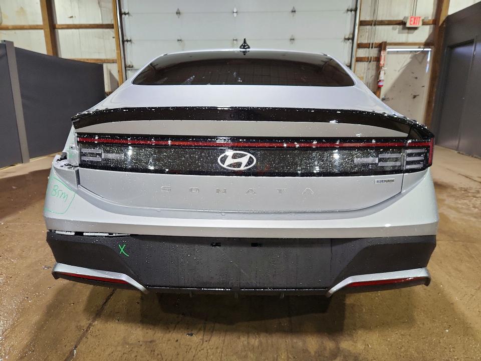2026 Hyundai Sonata hybrid VIN KMHL24JJXTA164386 COPART salvage auction — SIDE, Fl - Certificate Of Title, sold $10,900 on 2026-07-20 (photo 6)