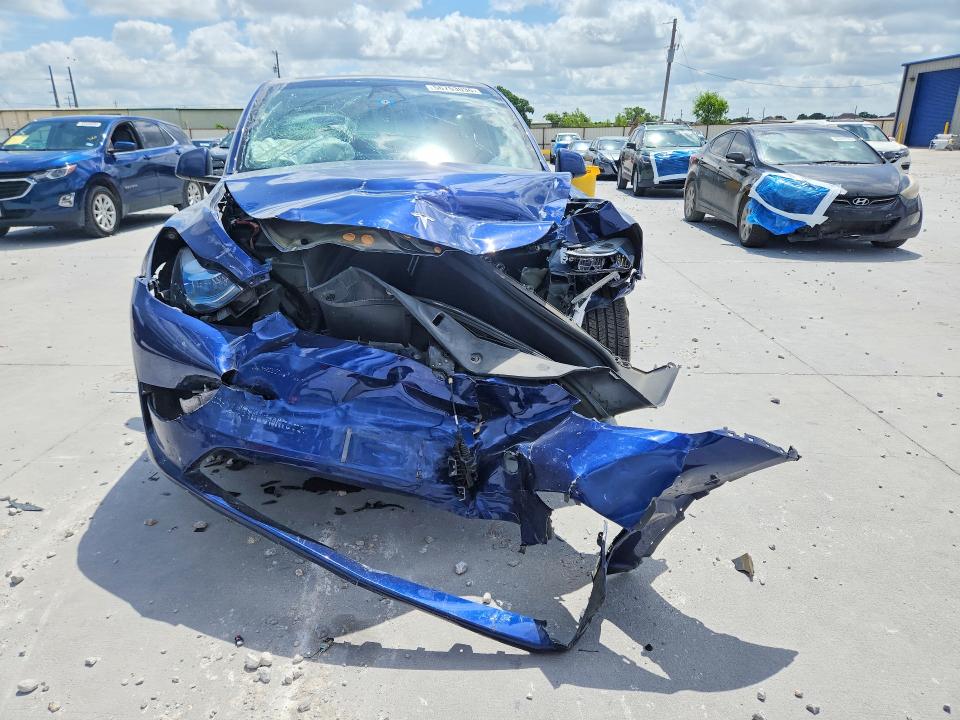 2023 Tesla Model y VIN 7SAYGDEE7PA063943 COPART salvage auction — FRONT END, Tx - Salvage Vehicle Title, sold $6,100 on 2026-07-24 (photo 5)