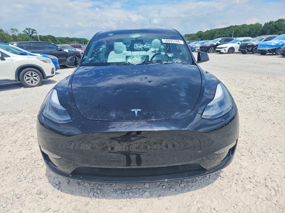 2023 Tesla Model y VIN 7SAYGDEF7PF892359 COPART salvage auction — HAIL, Mo - Salvage Certificate Of Title, sold $12,600 on 2026-07-29 (photo 5)