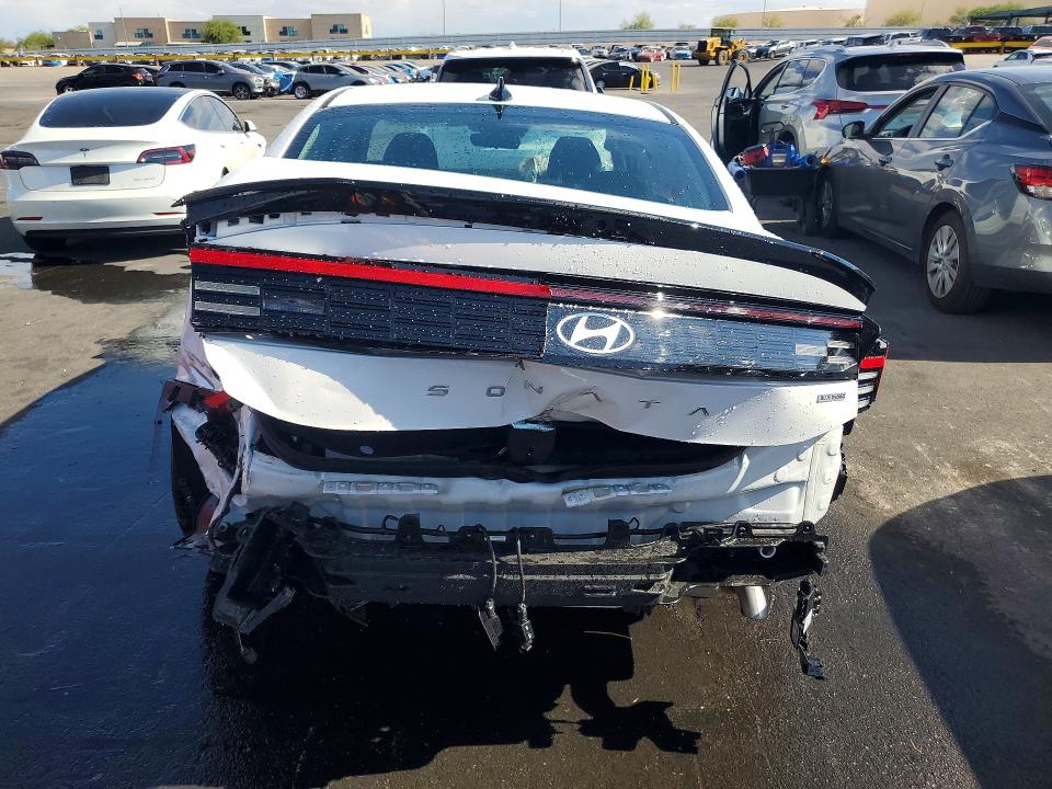 2026 Hyundai Sonata hybrid VIN KMHL24JJ8TA154035 COPART salvage auction — FRONT END, Fl - Certificate Of Destruction, sold $125 on 2026-07-22 (photo 6)