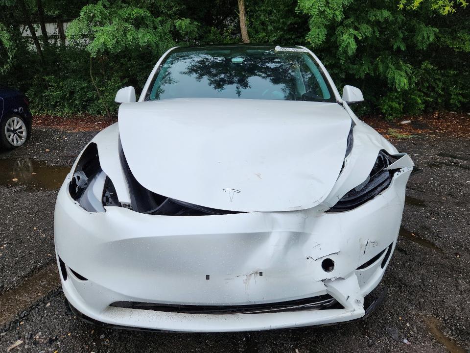 2025 Tesla Model y VIN 7SAYGDEE9SA370930 COPART salvage auction — FRONT END, Va - Cert Of Title - Salvage, sold $8,000 on 2026-07-30 (photo 5)